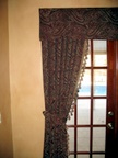 Fixed panel with shaped valance