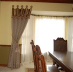 Fixed panel with attached valance