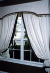Shaped valance, custom window treatments and drapery