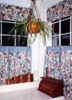 Flat valance over banded rod pocket panels, custom window treatments and drapery