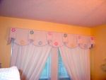 Shaped valance, custom window treatments and drapery