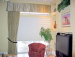 Box  pleat valance over fixed panel, custom window treatments and drapery