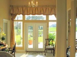 Valance over fixed drapes, custom window treatments and drapery