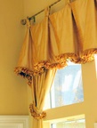 Wraped tab top, pleated with trim, custom window treatments and drapery